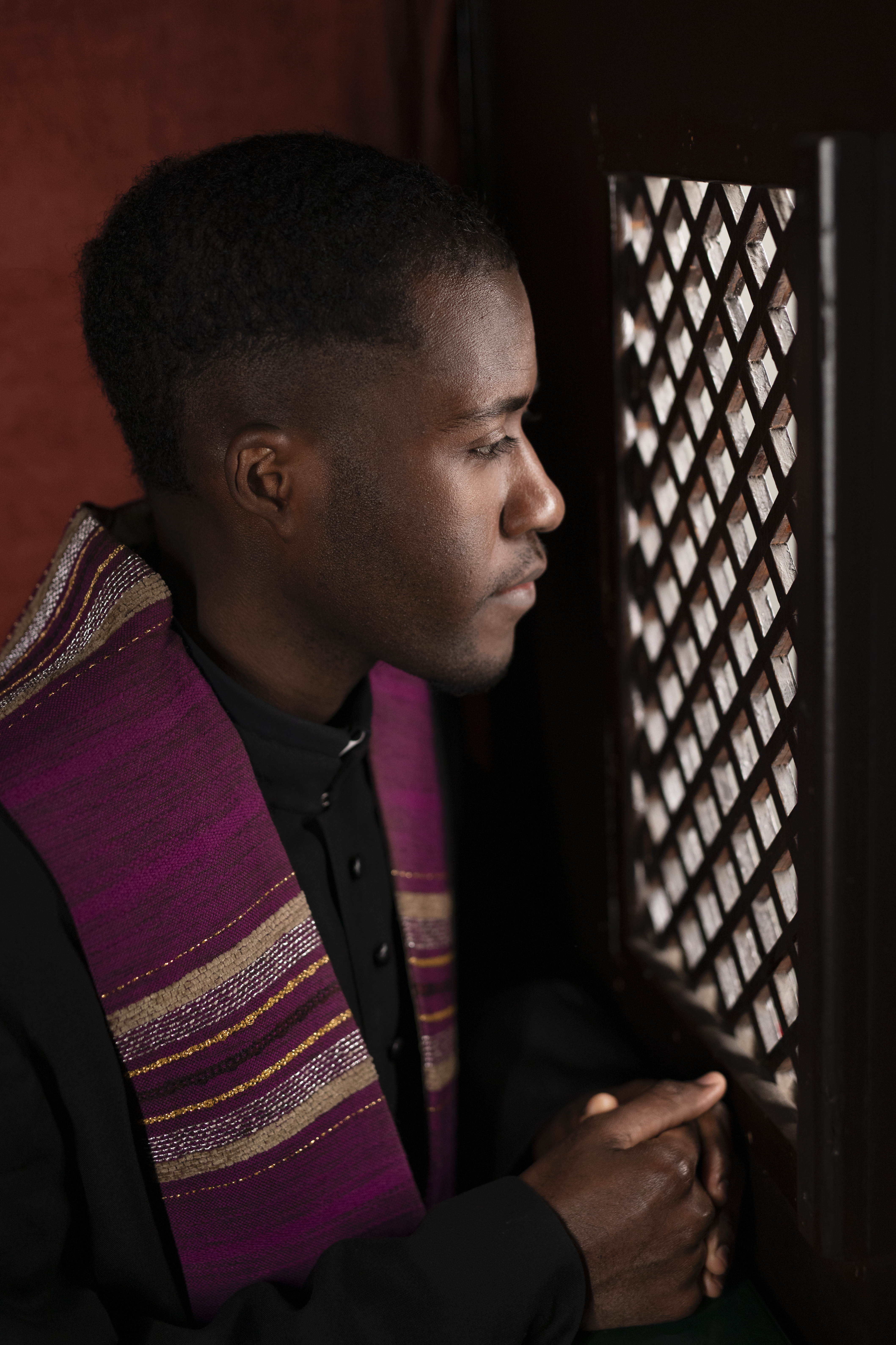 young-male-priest-inside-confessional-booth-church 5 Steps to Forgiveness
